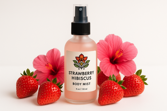 Please generate a light pink 4 oz  body mist  with a black fine mist sprayer  Please surround it with strawberries and hibiscus flower  Please include an african flowerlogo on the label  Please call the mist Strawberry Hibiscus Body Mist  