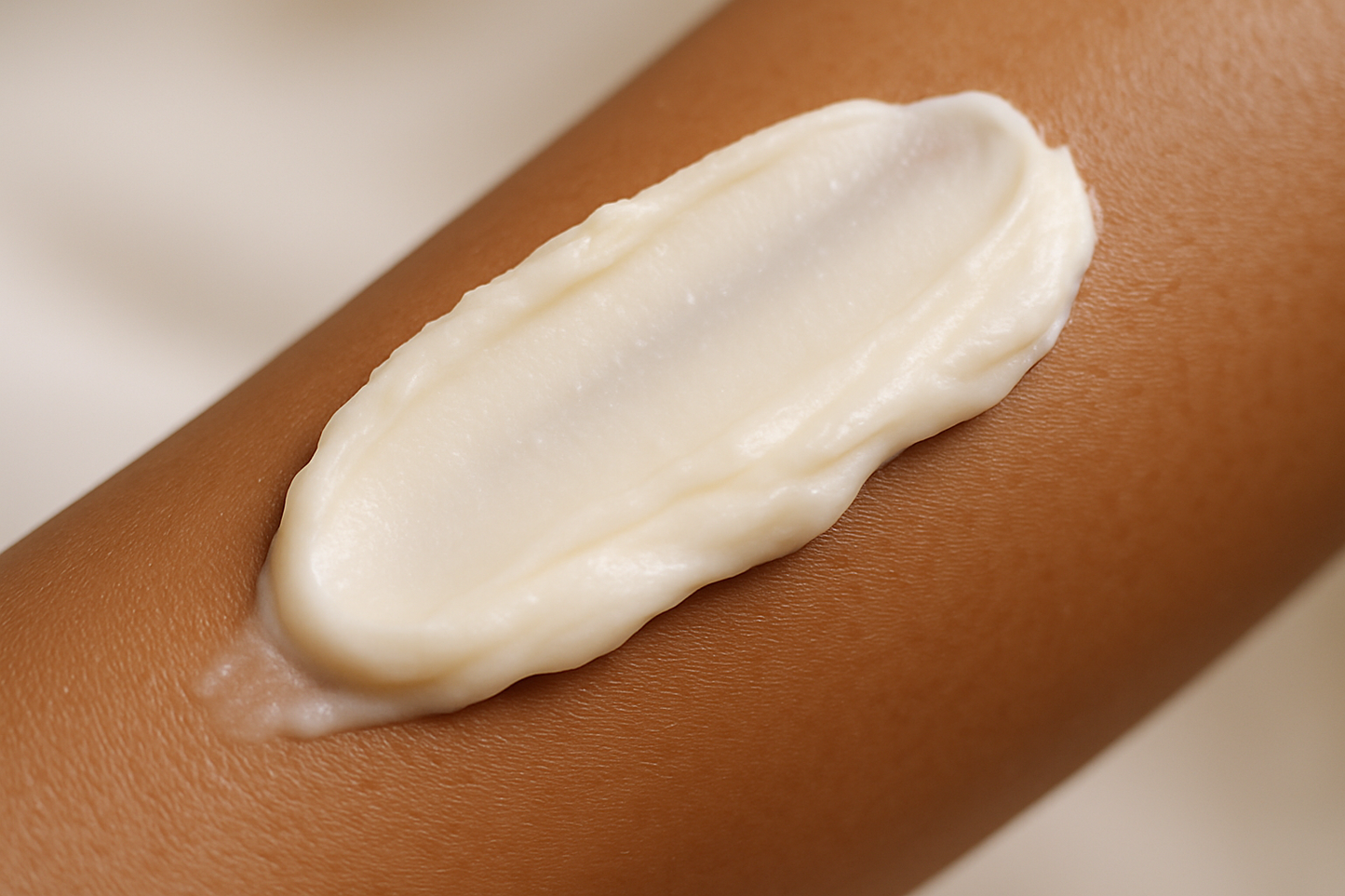 swipe of creamy shea butter on an arm